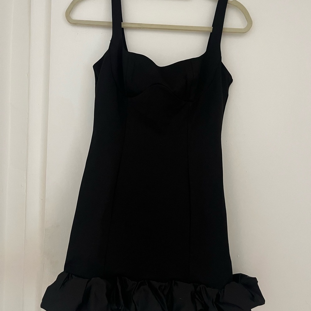 Elegant Black Dress with Ruffle Hem